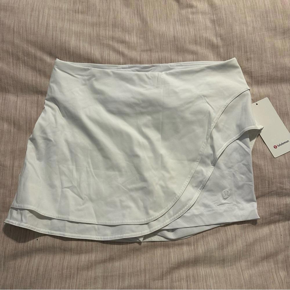 Lululemon Athletica Asymmetrical Layered
HR Tennis Skirt